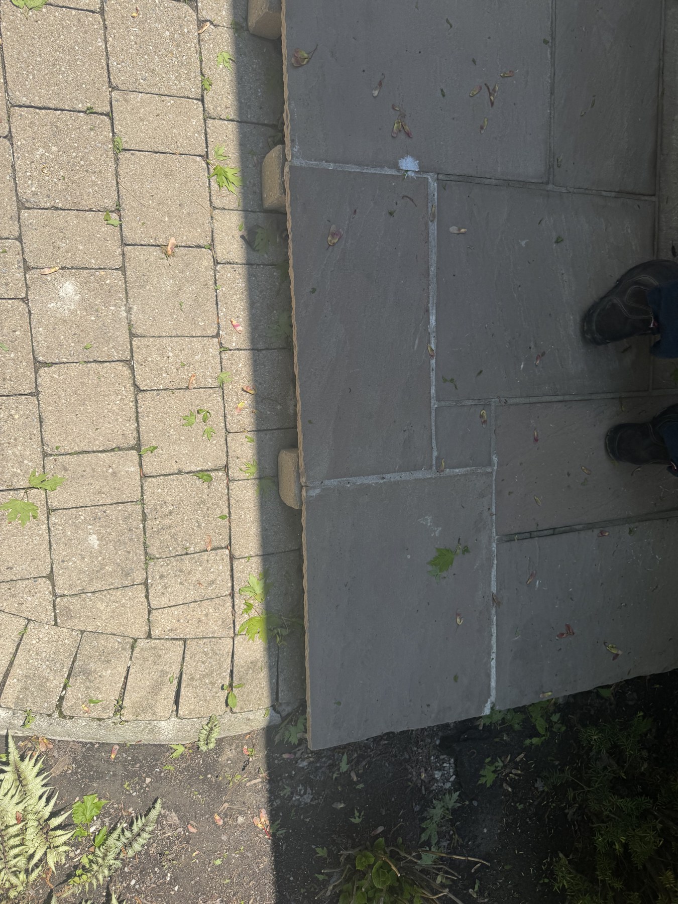 Flagstone patio repair blended with paver walkway