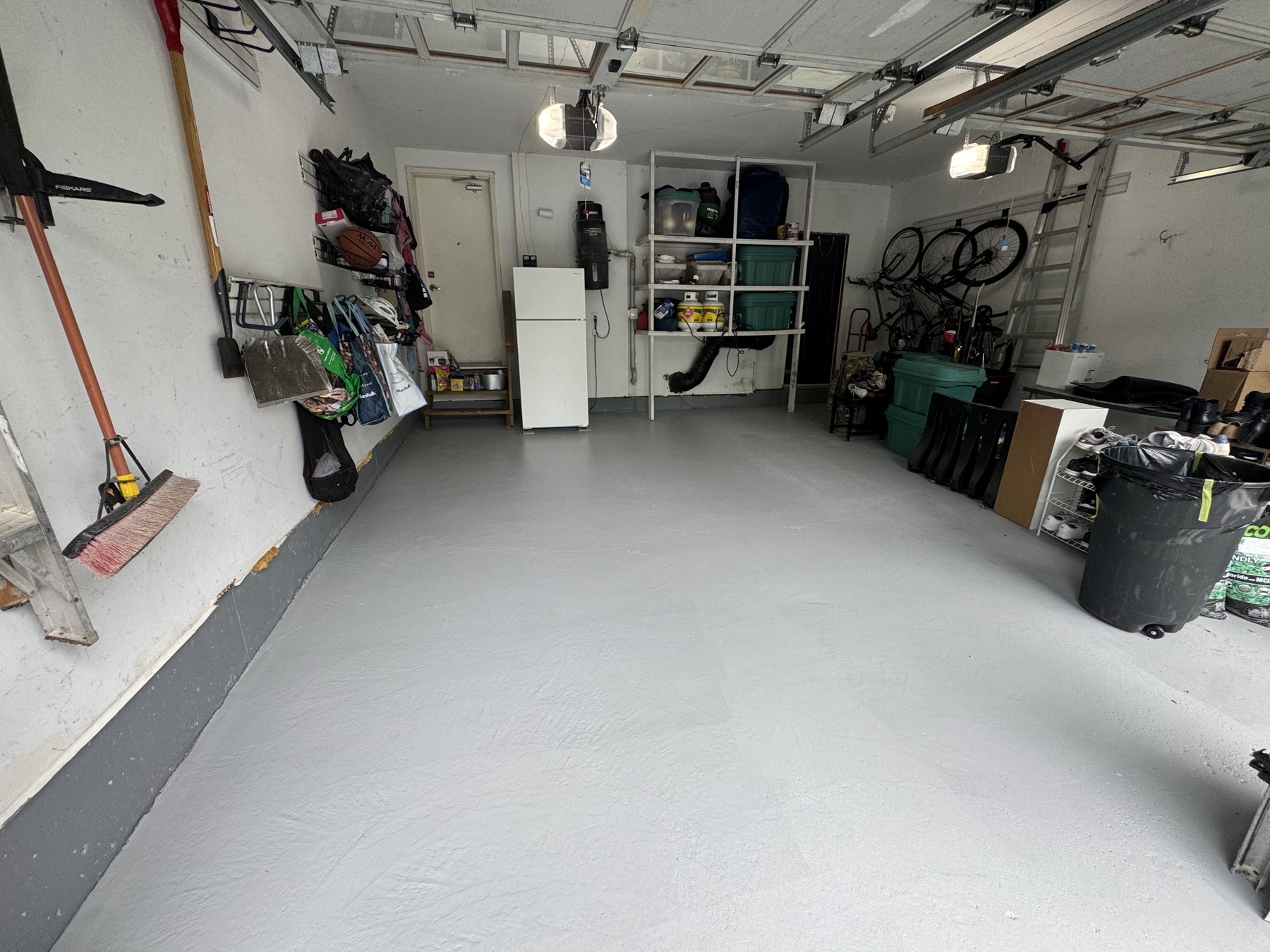 Freshly coated grey garage floor after