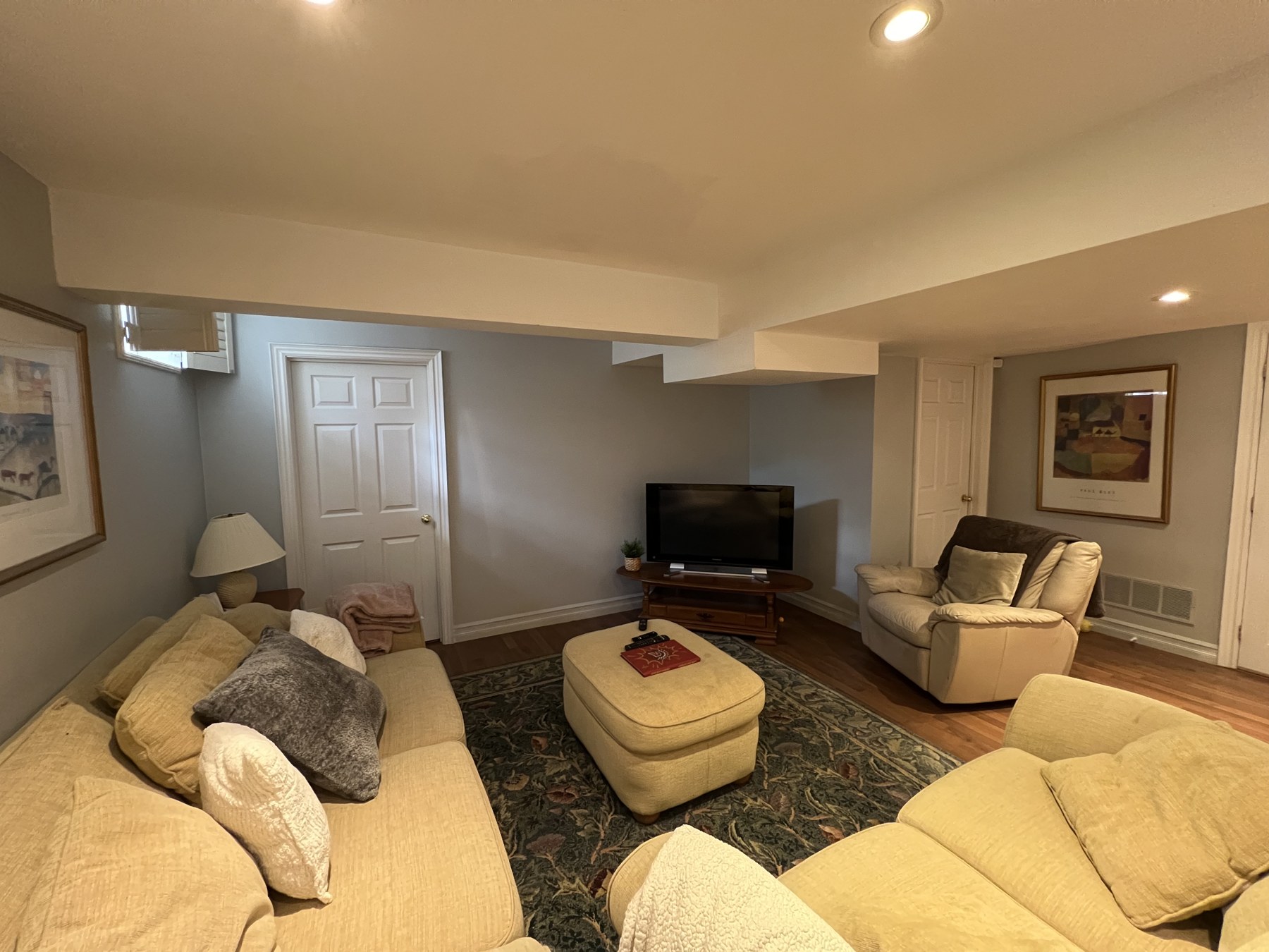 Basement living area after