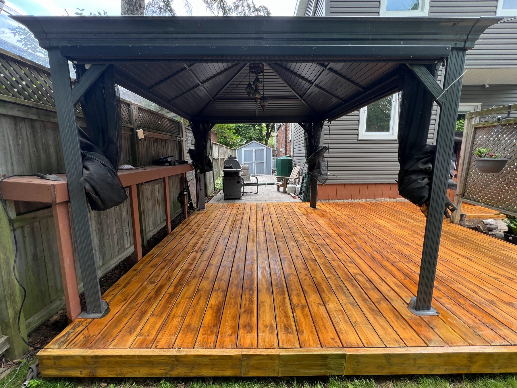 Deck under gazebo after golden stain