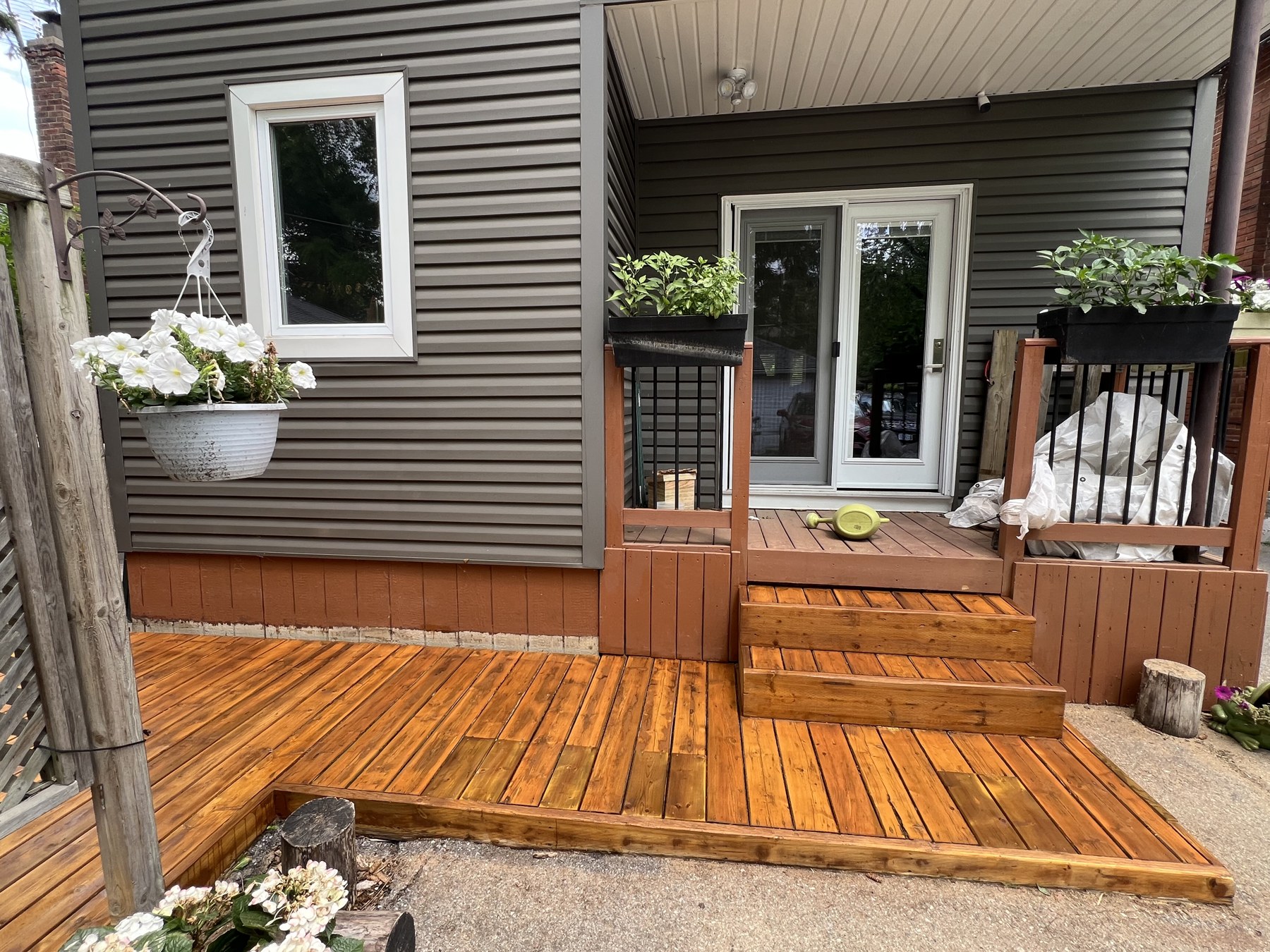 Deck steps by patio doors after staining